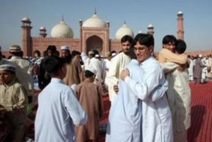 Pakistani men greeting.