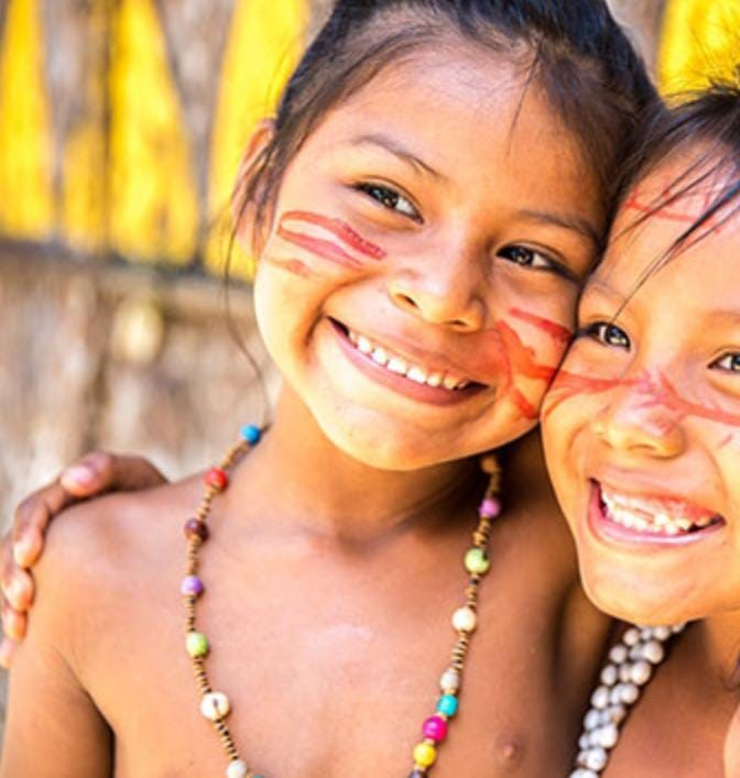 Young girls with big smiles from South America (Brazil).